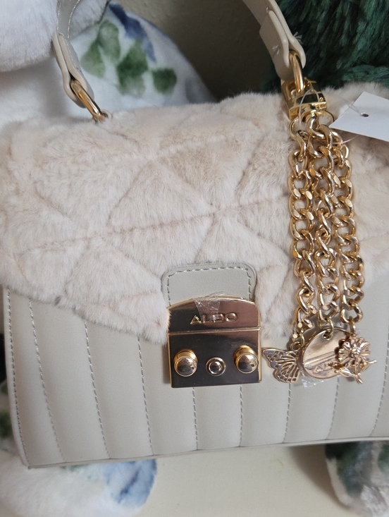 Aldo Handbags - NWT ALDO Cream Quilted Faux Fur Top Satchel with Gold Chain Charms